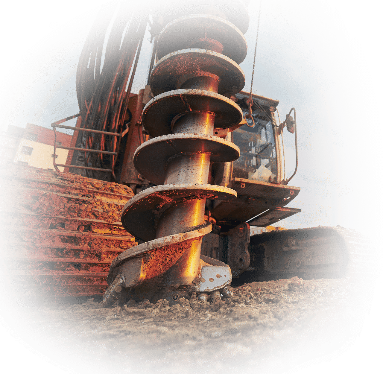 Kaivinkone poraushommissa.